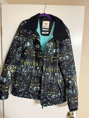 Roxy Black Jacket with Teal Interior and Purple Hood Accent